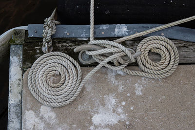 Close-up of rope tied on metal