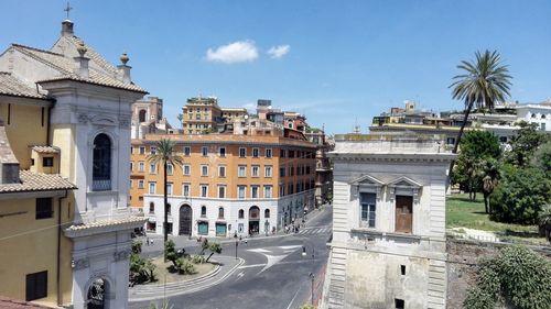 Buildings in city against sky