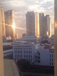 Buildings in city against sky