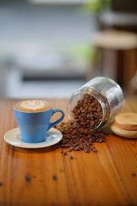 Close-up of coffee cup on table