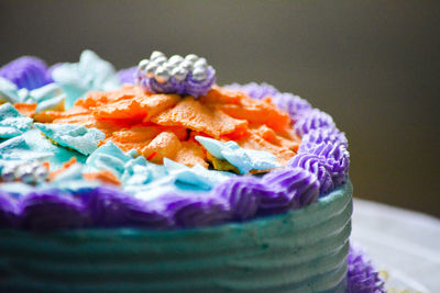 Close-up of multi colored cake on table