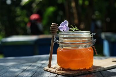 Close-up of drink in glass jar on table