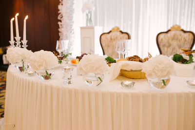 Wedding table for the bride and groom in a classic restaurant