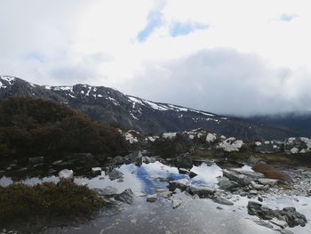 Mountains with sky in background