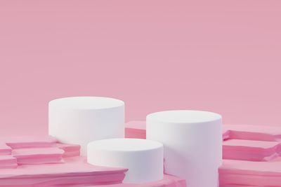 Close-up of tea cup on table against wall