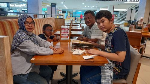 Portrait of family in restaurant