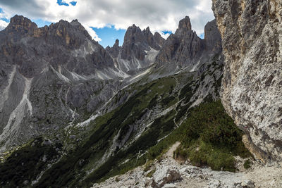 Cadini di misurina panorama on hiking mountain path, trentino, italy