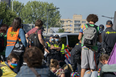 People on street in city