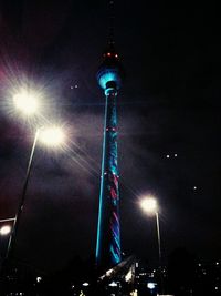 Low angle view of illuminated buildings at night
