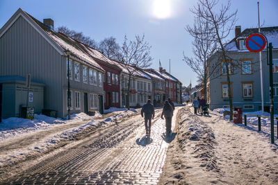 View of people walking in winter