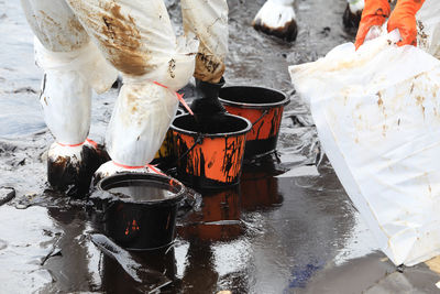 Male workers working in mud