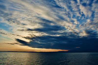 Scenic view of sea against dramatic sky