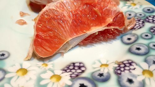 High angle view of fish in plate on table