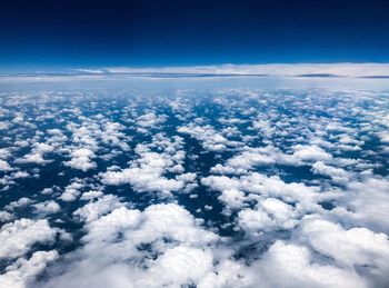 High angle view of cloudscape over sea against sky