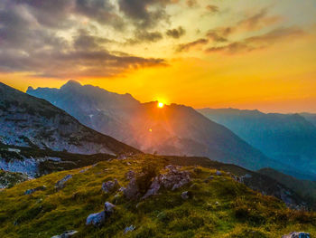 Scenic view of mountains against sky during sunset