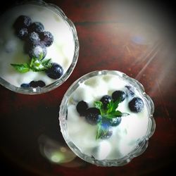 High angle view of fruits in glass on table