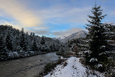 Scenic view of mountains against sky during winter