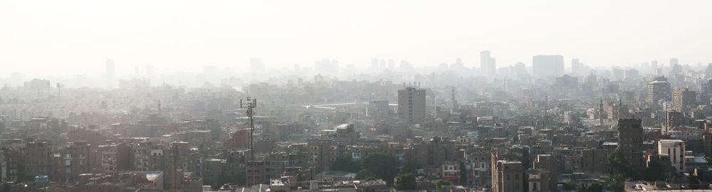 Panoramic view of cityscape against sky