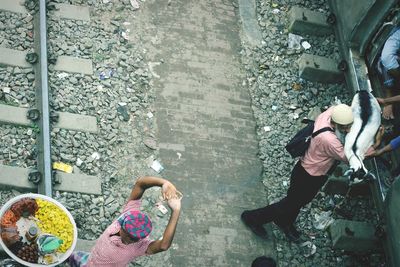 High angle view of people at railroad station