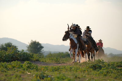 View of horse on landscape against clear sky