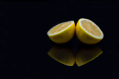 Close-up of fruits against black background