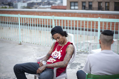Young couple sitting on bench