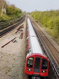 Red train on railroad track