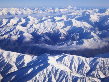 Scenic view of snow covered mountains