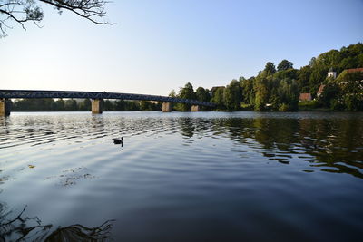 View of bridge over lake against sky