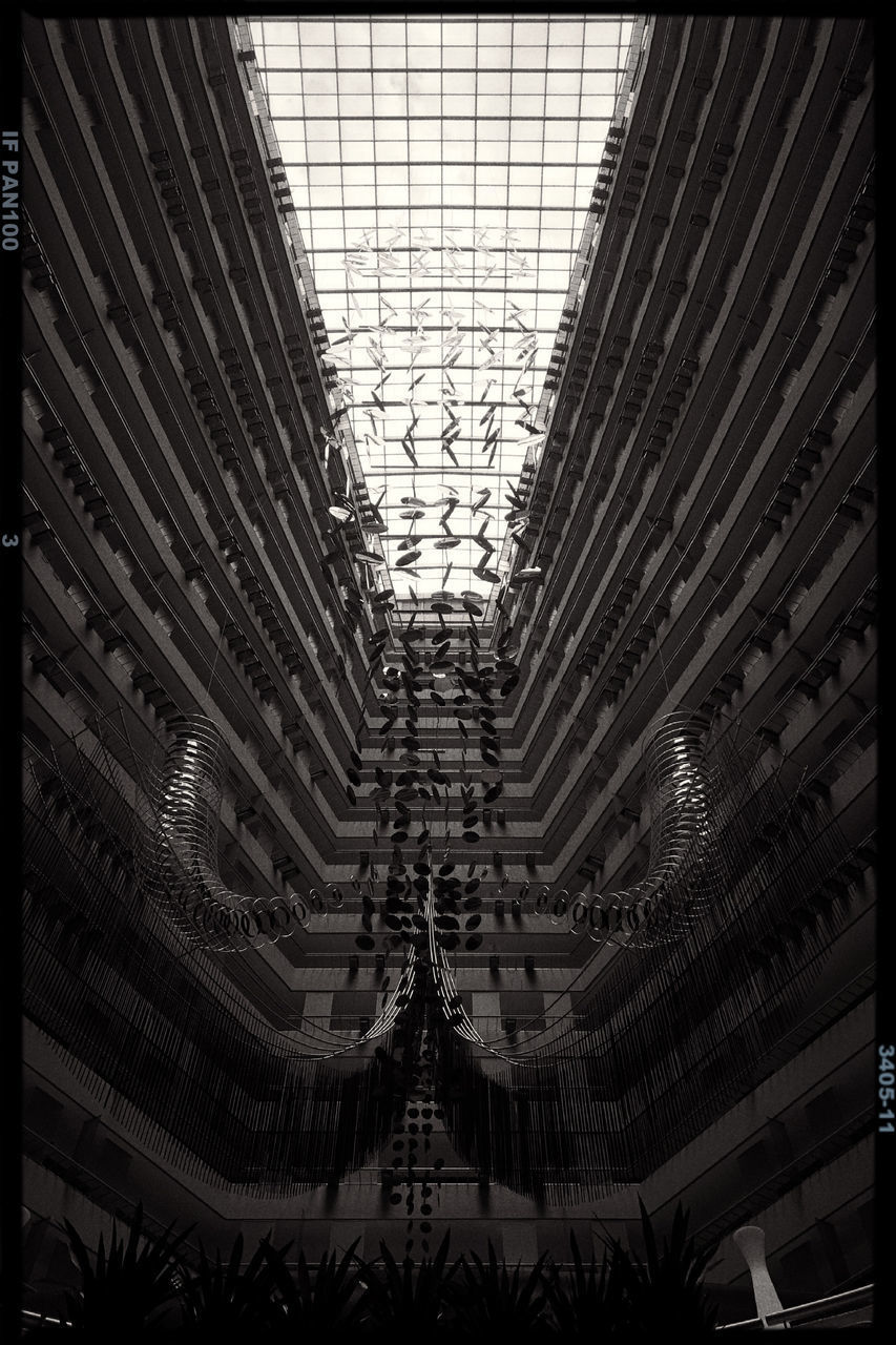 LOW ANGLE VIEW OF BUILDINGS AGAINST SKY