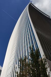 Low angle view of skyscraper against clear sky