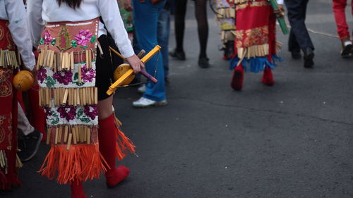 Low section of people on street during festival