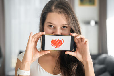 Young woman using mobile phone