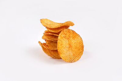 Close-up of bread against white background