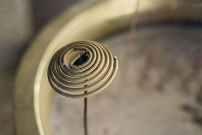 High angle view of burning coil