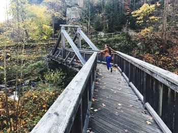 Man on footbridge