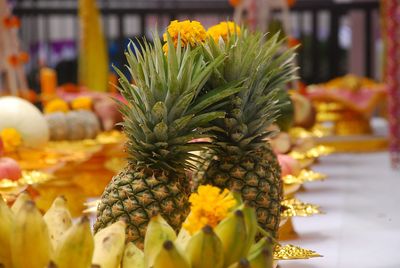 Close-up of fresh orange fruits in market for sale