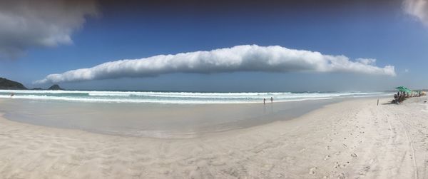 Panoramic view of beach against sky