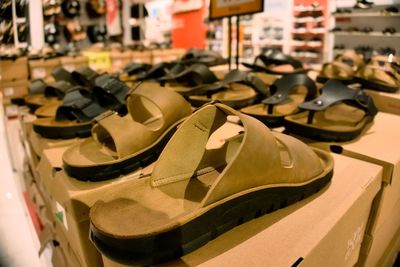 Close-up of shoes on table