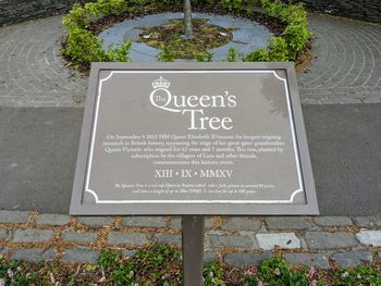 High angle view of information sign on street