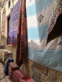 Traditional rugs against wall in fez