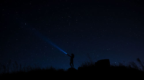 Low angle view of stars in sky at night