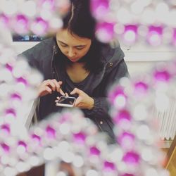 Young woman using mobile phone