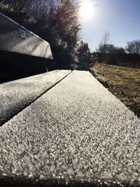 Close-up of road against sky