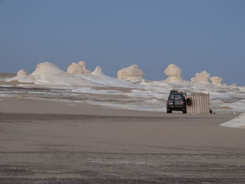 Scenic view of desert against clear sky