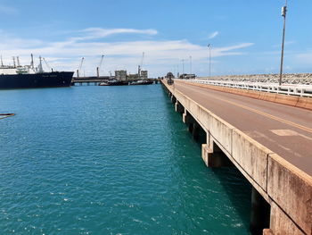 Pier over sea against sky