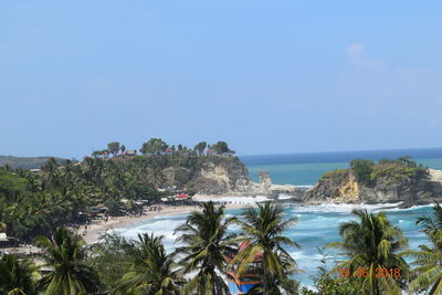 Scenic view of sea against clear blue sky