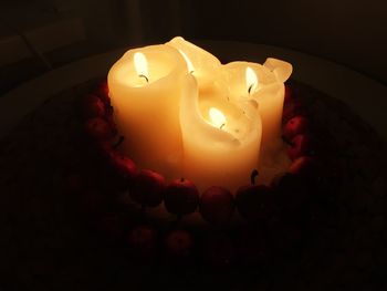 High angle view of illuminated candle