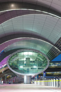 Low angle view of illuminated modern building