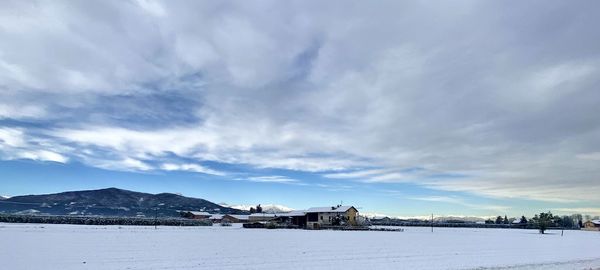 Scenic view of snowcapped mountain against sky
